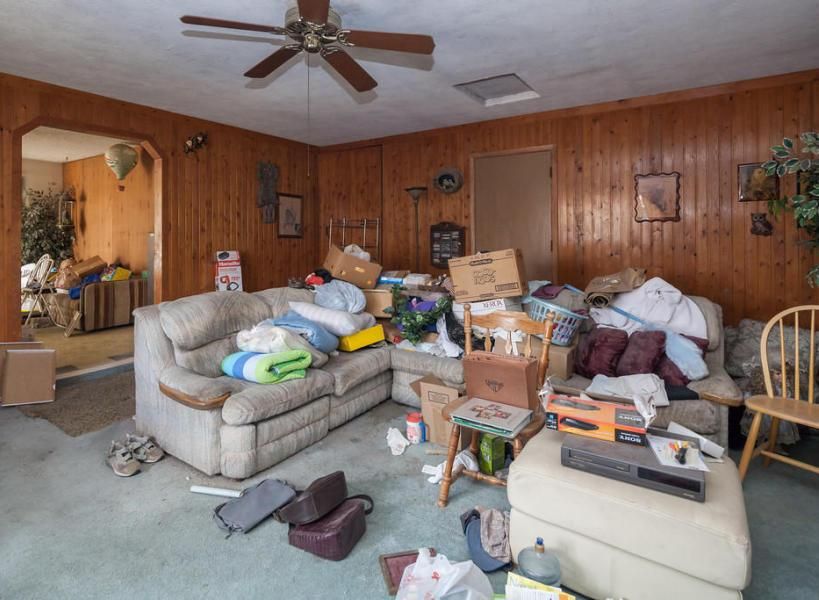 cluttered apartment living room